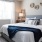 a bed with white sheets