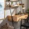 a table with a chair and a shelf with objects on it