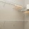 a room with a white wall and a white ceiling