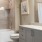 a bathroom with a tub toilet and sink