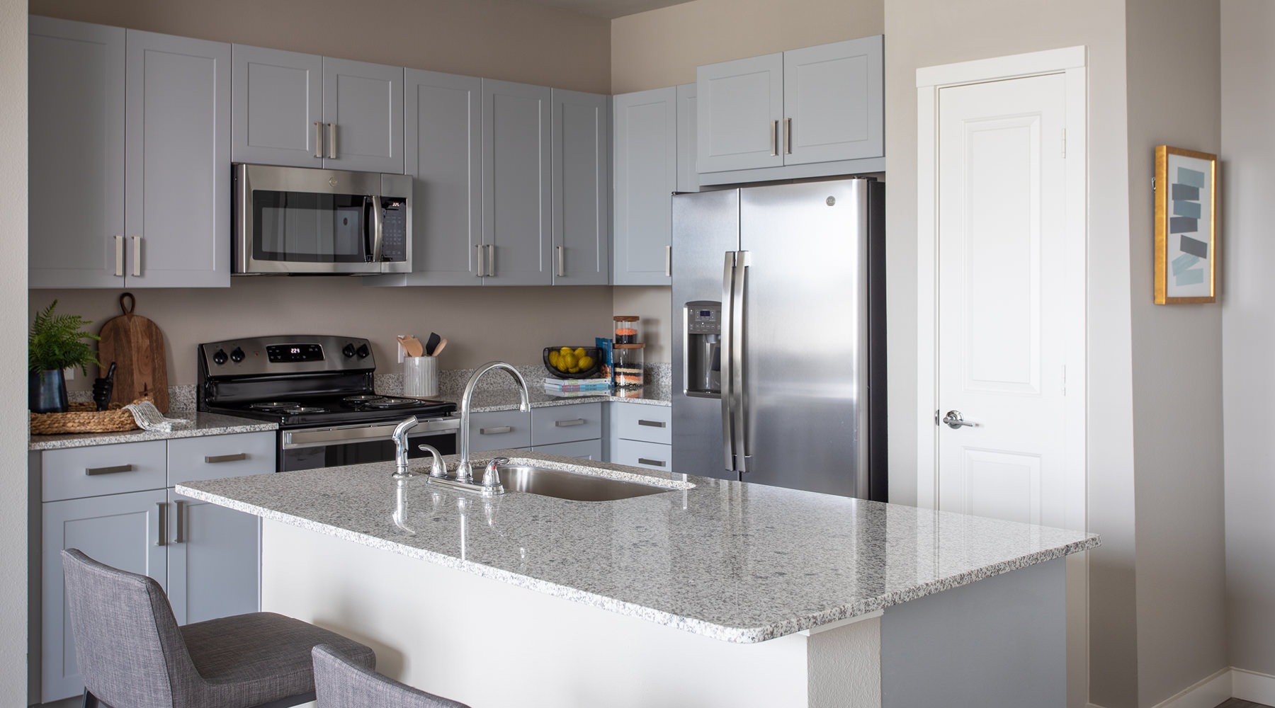 Stylish kitchens with designer features Well-lit kitchen with ample counter space